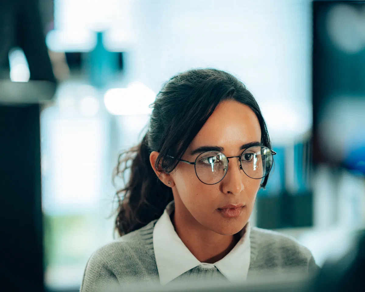 Woman looking at PC