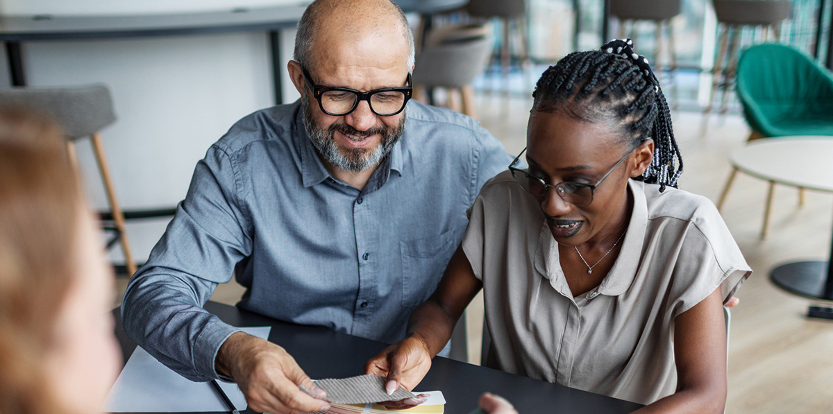 Man and woman sitting together for Interactive Design